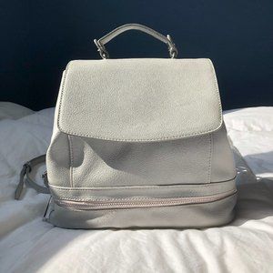 Grey vegan leather backpack.